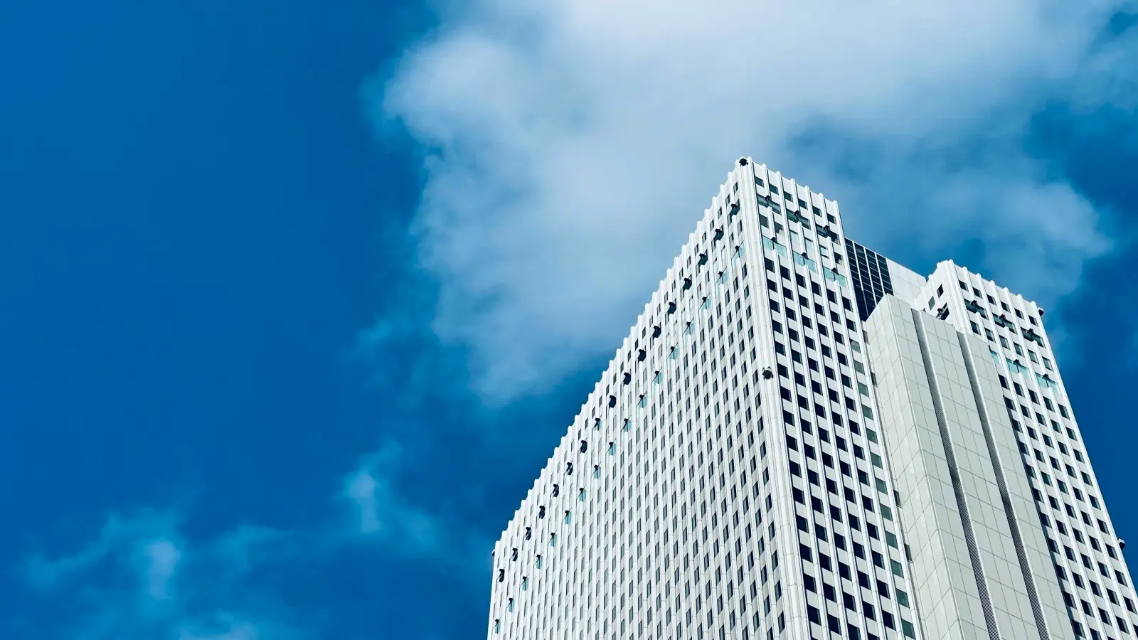 Modern building in Tokyo, symbolizing a digitally skills revolution workforce